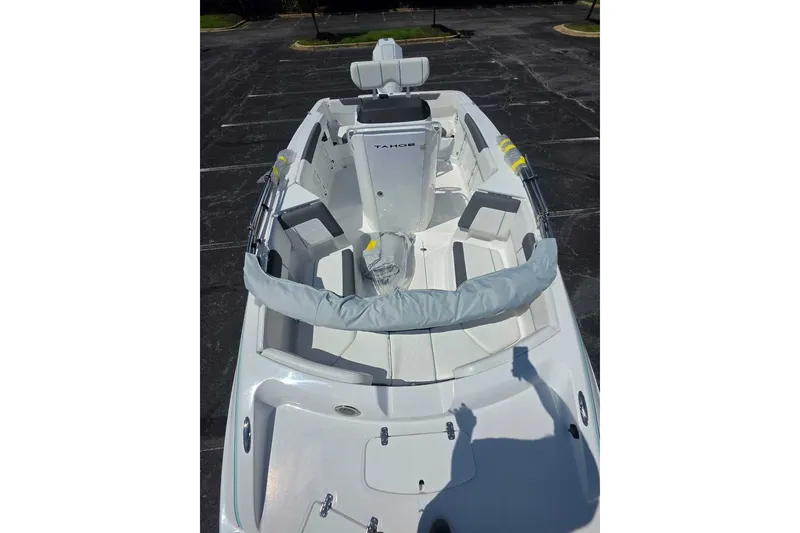 Slide: The Image of 2027 Tahoe 2150 CC boat with sleek white interior and modern seating arrangement. - 7