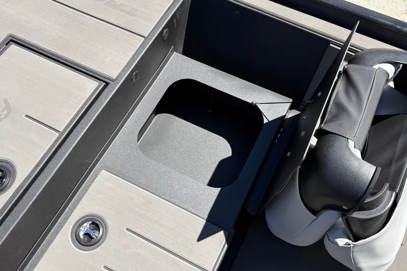 Slide: The Image of Interior view of 2027 Tracker Pro 170 boat, featuring seating and storage compartments. - 17