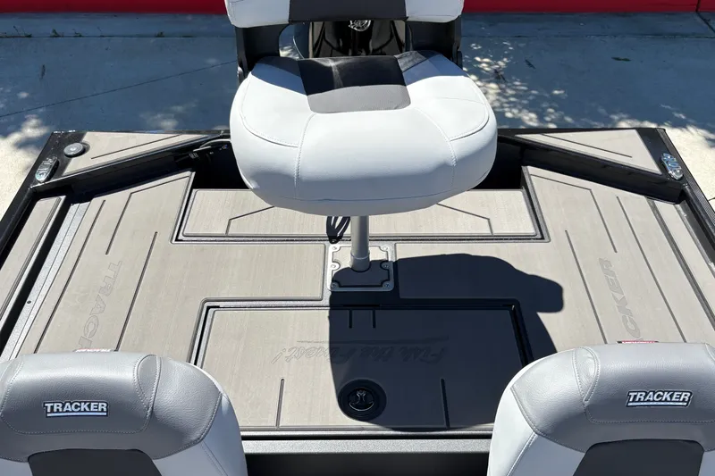 Slide: The Image of 2027 Tracker Pro 170 boat interior with cushioned seating and sleek design. - 28