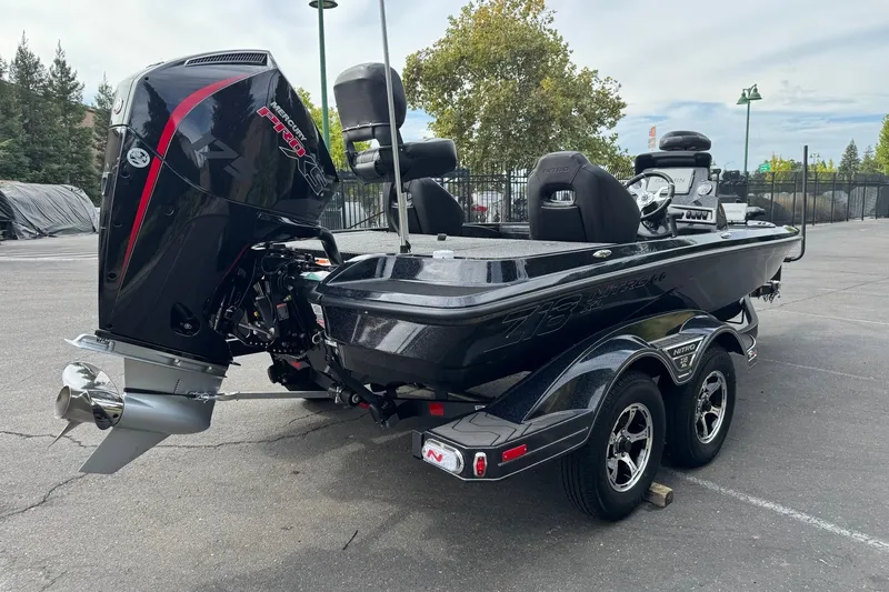 Slide: The Image of 2027 Nitro Z18 XL Pro boat with powerful Mercury engine in parking lot. - 5