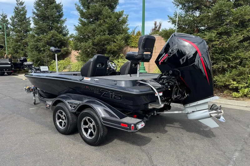 Slide: The Image of 2027 Nitro Z18 XL Pro boat with powerful engine, parked outdoors. - 1