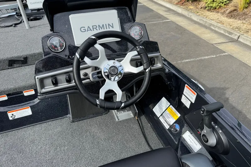 Slide: The Image of Steering console of 2027 Nitro Z18 XL Pro boat with Garmin display and controls. - 7