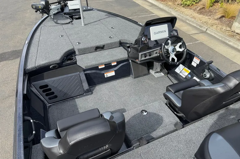 Slide: The Image of Interior of a 2027 Nitro Z18 XL Pro boat with Garmin navigation system. - 9