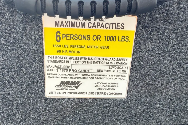 Slide: The Image of Capacity label for 2027 Lund 1875 Pro Guide boat, 6 persons or 1000 lbs, 90 HP motor. - 12