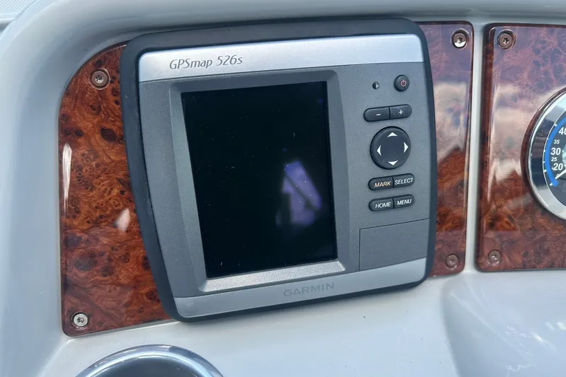 Slide: The Image of Garmin GPSmap 526s on 2004 Formula 280 Sun Sport dashboard with wood paneling. - 13
