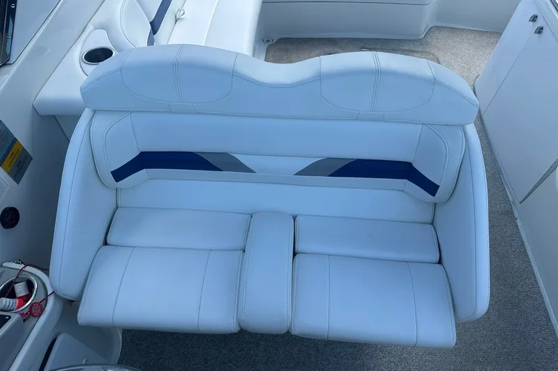 Slide: The Image of White leather seating on a 2004 Formula 280 Sun Sport boat interior. - 16
