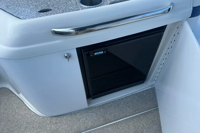 Slide: The Image of 2004 Formula 280 Sun Sport boat interior with mini fridge and countertop. - 29