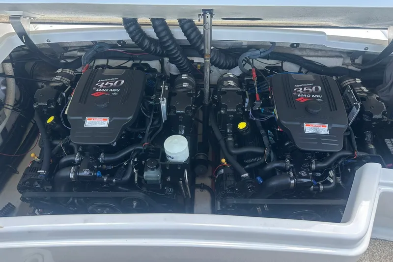 Slide: The Image of Twin MerCruiser 350 MAG MPI engines in a 2004 Formula 280 Sun Sport boat. - 20