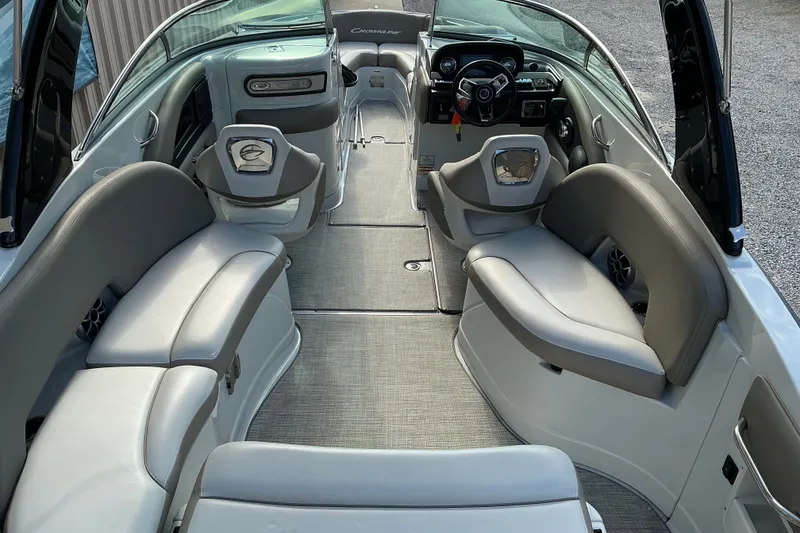 Slide: The Image of Interior of 2020 Crownline 290 SS boat with luxurious seating and modern dashboard. - 4