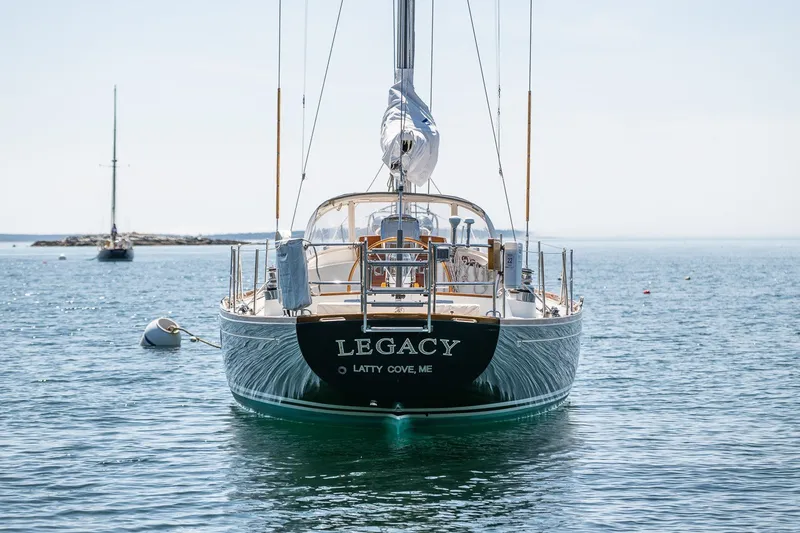 Slide: The Image of Hinckley Sou'wester 42 sailboat named "Legacy" on calm water, 1987 model. - 50