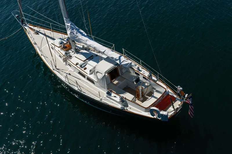 Slide: The Image of 1987 Hinckley Sou'wester 42 sailboat on calm water, aerial view. - 4