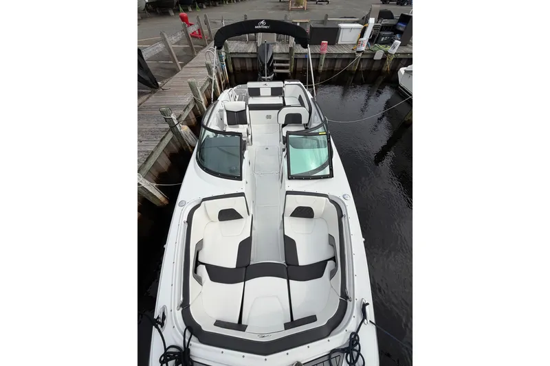 Slide: The Image of 2021 Monterey M-45 boat docked, featuring spacious seating and sleek design. - 35
