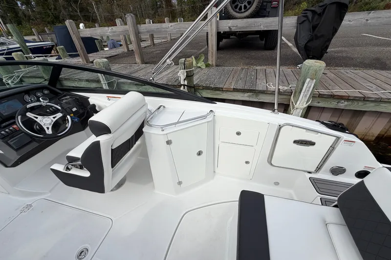 Slide: The Image of Cockpit of a 2021 Monterey M-45 boat with steering wheel and seating. - 20