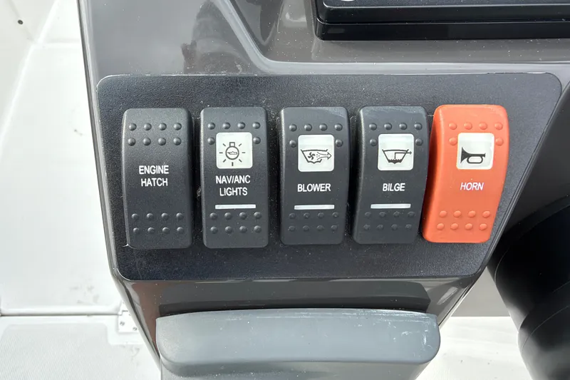 Slide: The Image of Control panel of a 2021 Monterey M-45 boat with labeled switches. - 41