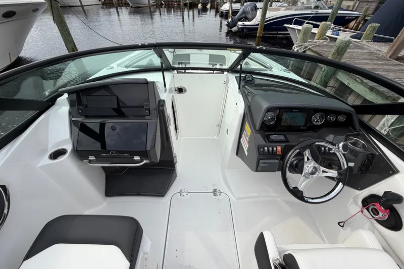 Slide: The Image of Cockpit view of 2021 Monterey M-45 boat with modern dashboard and steering wheel. - 30
