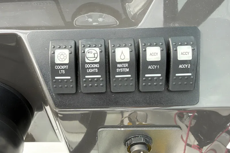 Slide: The Image of Control panel of a 2021 Monterey M-45 boat with labeled switches. - 42