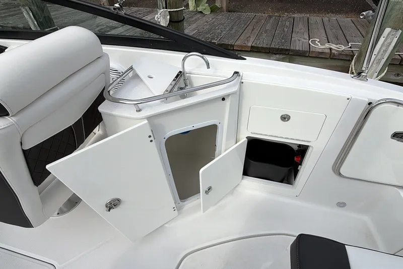 Slide: The Image of Interior view of a 2021 Monterey M-45 boat with open storage compartments. - 21