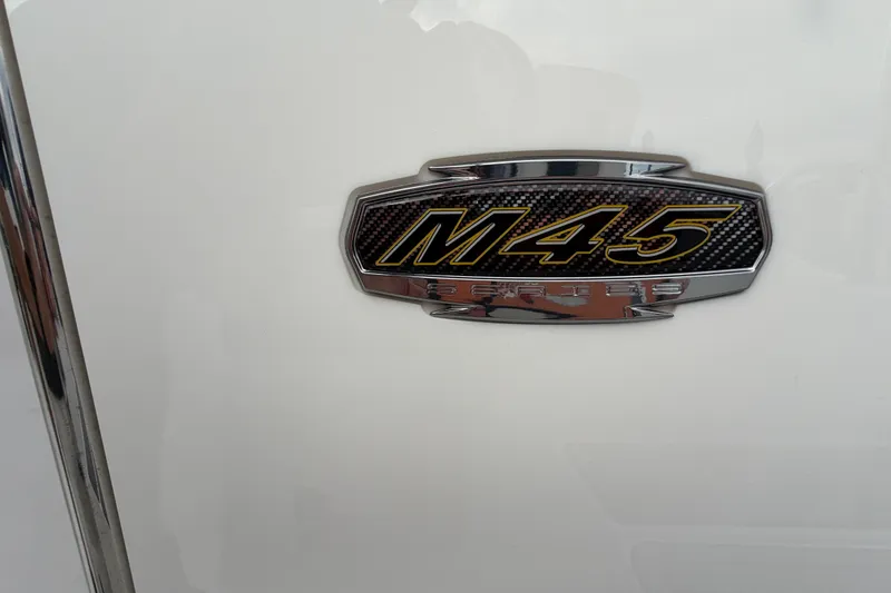 Slide: The Image of 2021 Monterey M-45 emblem on a white surface. - 38