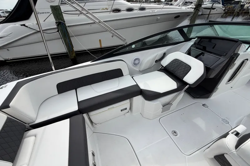 Slide: The Image of Luxurious interior of a 2021 Monterey M-45 boat with sleek seating design. - 24