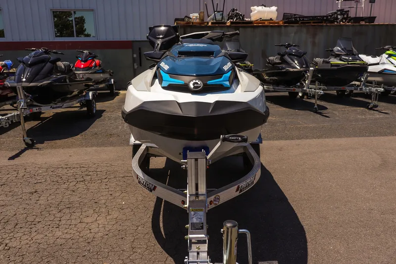 Slide: The Image of 2026 Sea-Doo FishPro Sport 170 on trailer, displayed outdoors with other watercraft. - 8
