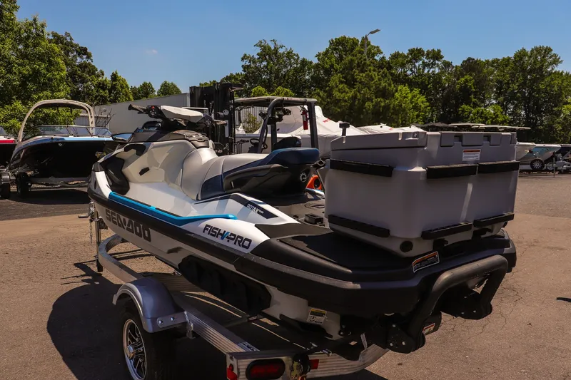 Slide: The Image of 2026 Sea-Doo FishPro Sport 170 on trailer, parked outdoors under clear sky. - 5