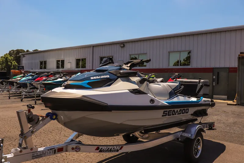 Slide: The Image of 2026 Sea-Doo FishPro Sport 170 on trailer, parked outside dealership. - 7