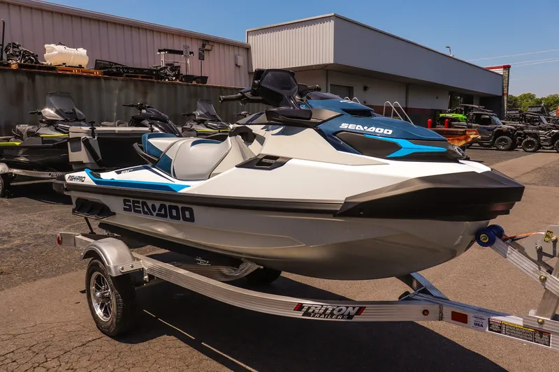 The Image of 2026 Sea-Doo FishPro Sport 170 on trailer, parked outside dealership. - 1