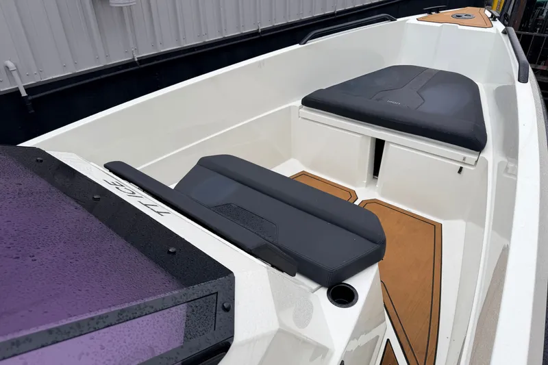 Slide: The Image of 2024 Iron 707 boat interior with sleek seating and modern design elements. - 20