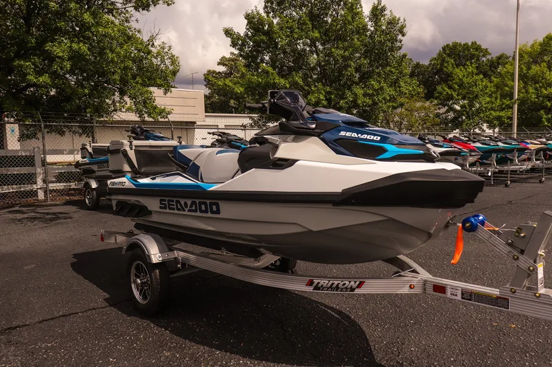 Slide: The Image of 2026 Sea-Doo FishPro Sport 170 on trailer, parked outdoors, showcasing sleek design. - 3