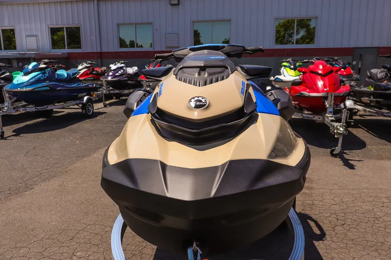 Slide: The Image of 2026 Sea-Doo Wake 170 jet ski displayed outdoors with other models. - 8