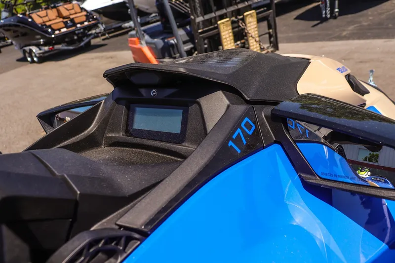 Slide: The Image of 2026 Sea-Doo Wake 170 dashboard and controls, featuring sleek blue design. - 12