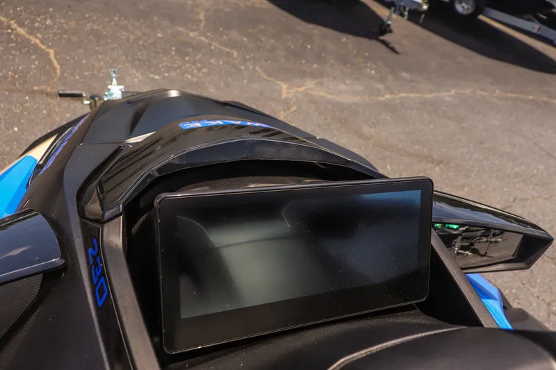 Slide: The Image of 2026 Sea-Doo Wake Pro 230 dashboard with digital display, parked on asphalt. - 14