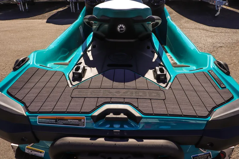 Slide: The Image of 2026 Sea-Doo GTX Limited 325, teal rear deck view, showcasing sleek design and features. - 11