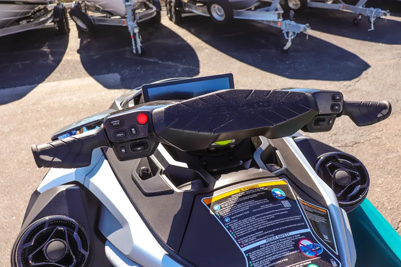 Slide: The Image of 2026 Sea-Doo GTX Limited 325 handlebars and dashboard, showcasing controls and display. - 12