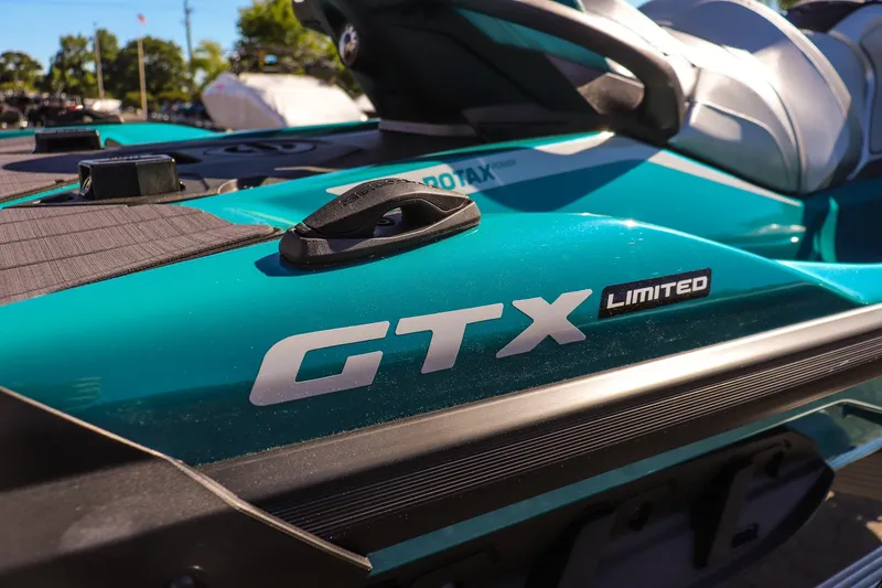 Slide: The Image of 2026 Sea-Doo GTX Limited 325 jet ski, close-up of logo and design details. - 10