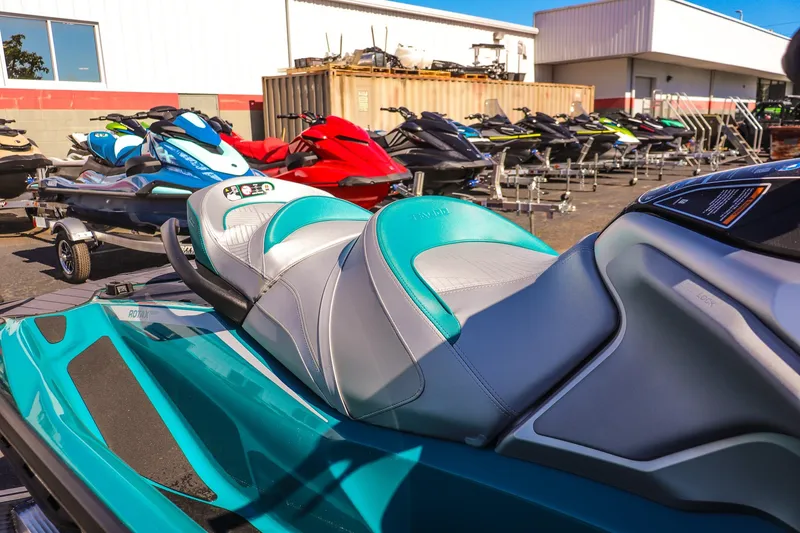 Slide: The Image of 2026 Sea-Doo GTX Limited 325 jet ski in a showroom, featuring sleek design and vibrant colors. - 9