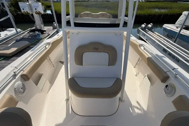 Slide: The Image of 2019 Key West 239 FS boat interior with cushioned seating and sleek design. - 16