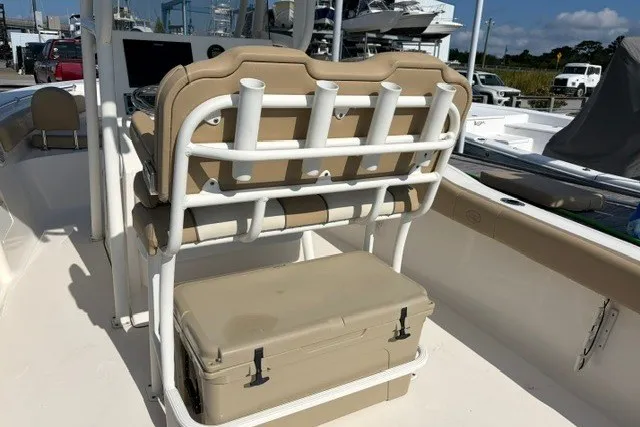 Slide: The Image of 2019 Key West 239 FS boat interior with seating and rod holders. - 19