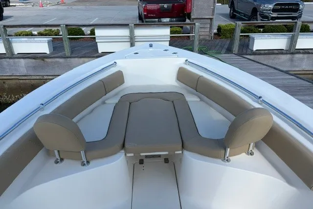 Slide: The Image of 2019 Key West 239 FS boat with spacious seating and sleek design. - 9