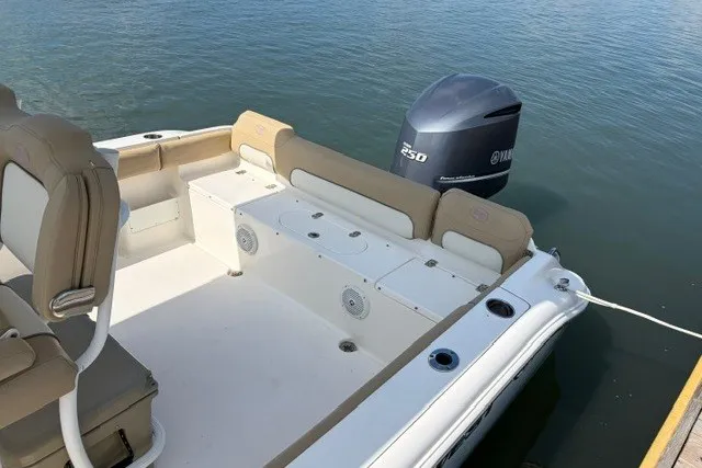 Slide: The Image of 2019 Key West 239 FS boat with Yamaha 250 engine, featuring spacious seating and storage. - 6
