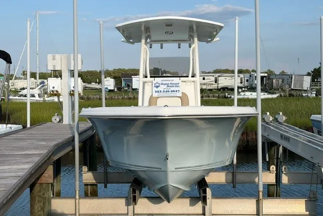 Slide: The Image of 2019 Key West 239 FS boat docked at marina, front view. - 1