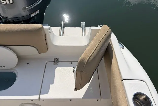 Slide: The Image of 2019 Key West 239 FS boat interior with tan seating and swim platform. - 15