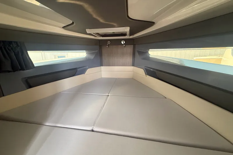Slide: The Image of Interior cabin of 2026 Navan C30 boat, featuring sleek design and comfortable seating. - 30