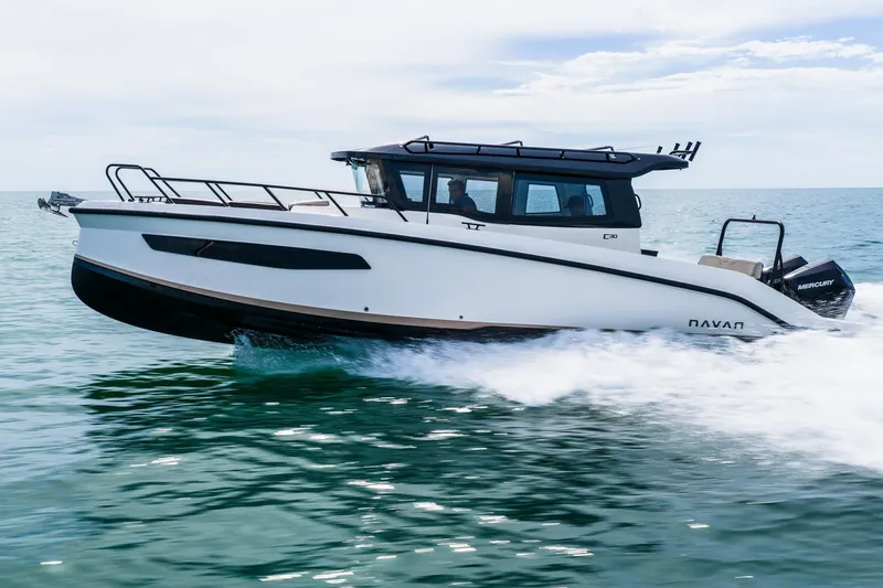 Slide: The Image of 2026 Navan C30 boat cruising on open water, showcasing sleek design and powerful performance. - 7