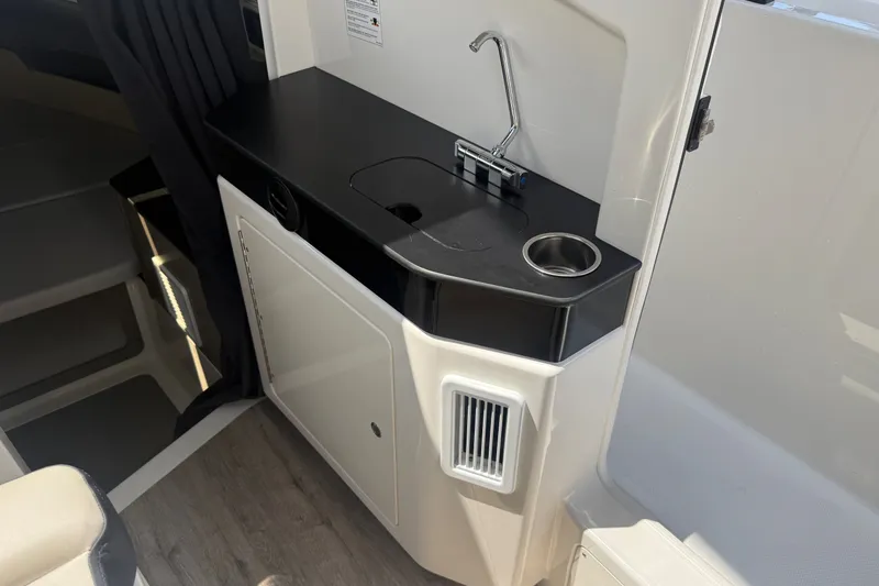 Slide: The Image of Compact kitchenette in 2026 Navan C30 with sink and storage. - 23