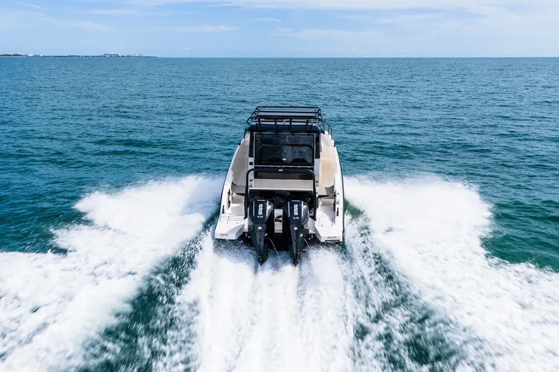 Slide: The Image of Navan C30 2026 boat cruising on open sea, leaving a wake behind. - 8