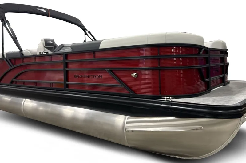The Image of 2026 Bennington 22 SSR pontoon boat with sleek red and black design. - 1