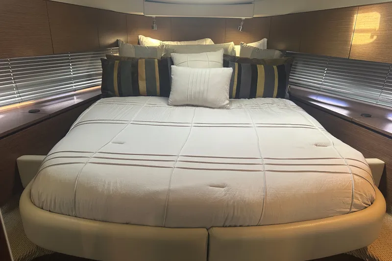 Slide: The Image of Luxurious bedroom interior of 2012 Sea Ray 470 Sundancer yacht with elegant bedding. - 35