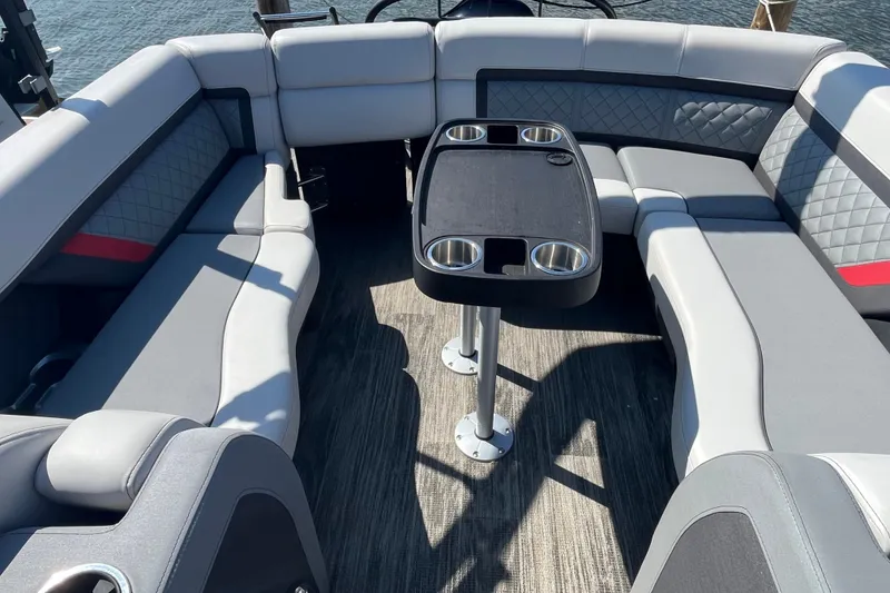Slide: The Image of Luxurious seating area on 2022 Godfrey AquaPatio 235 ULC pontoon boat. - 4