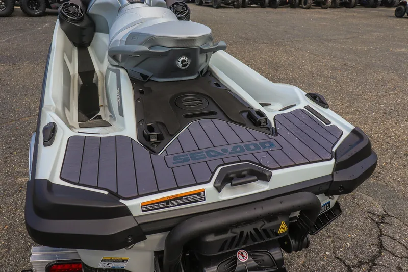 Slide: The Image of 2025 Sea-Doo GTX Limited 325 jet ski, rear view on pavement. - 16